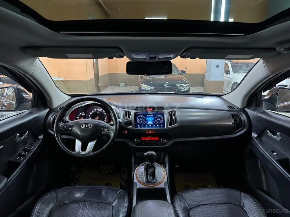 Kia Sportage — foto 4/4