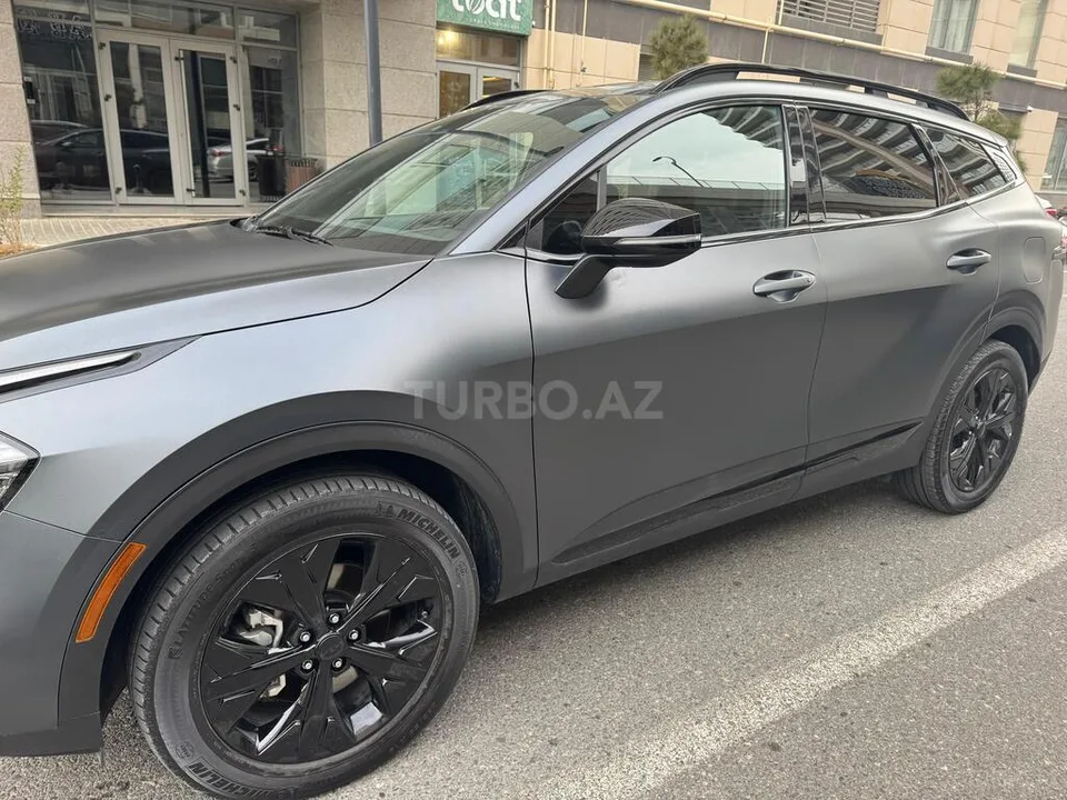 Kia Sportage — foto 4/4