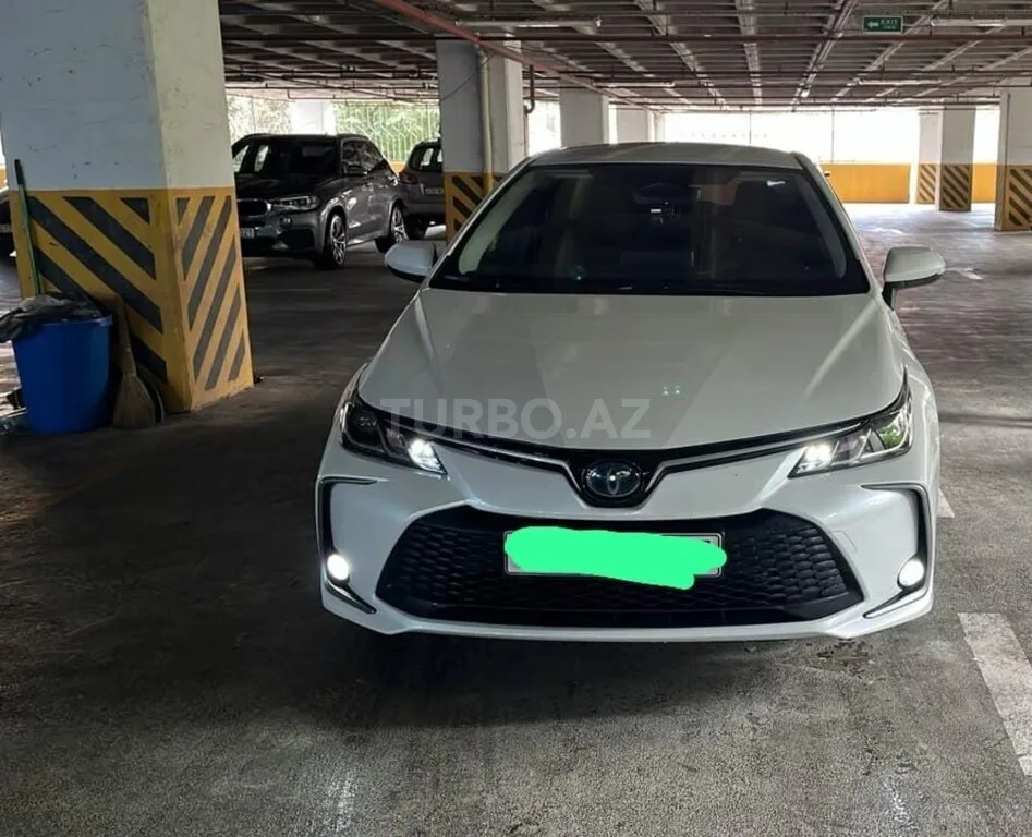 Toyota Corolla — foto 3/4