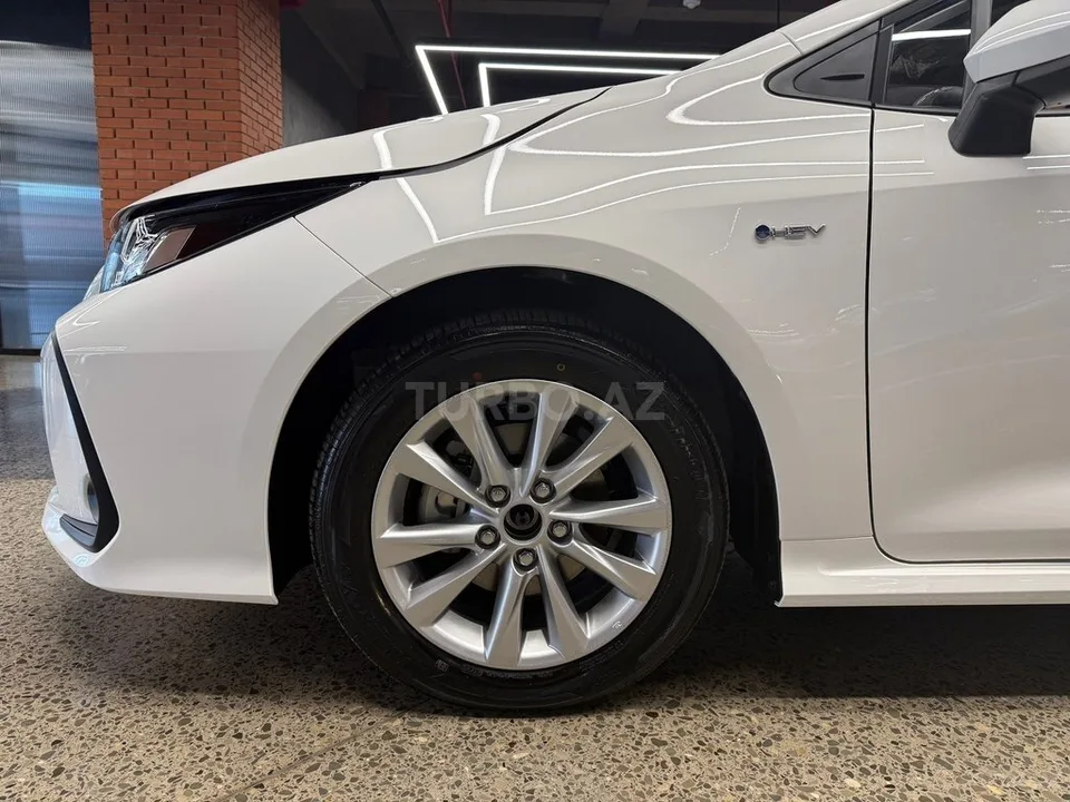 Toyota Corolla — foto 2/4