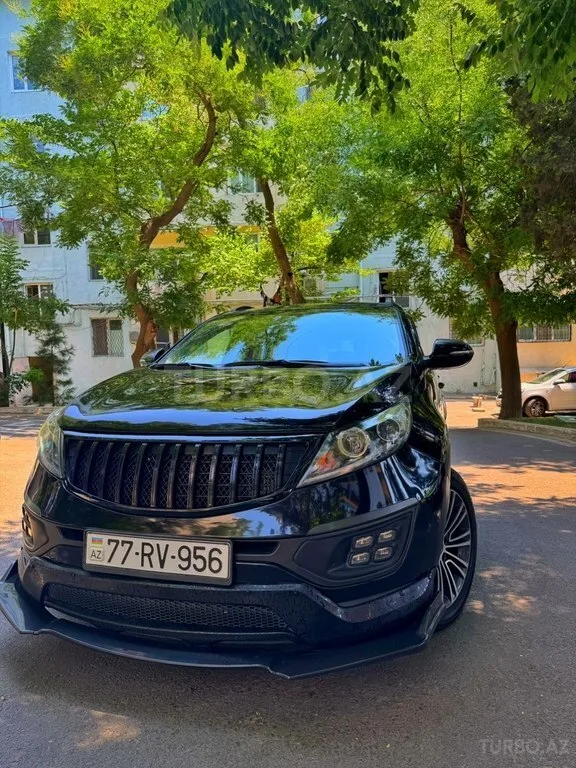Kia Sportage — фото 4/4