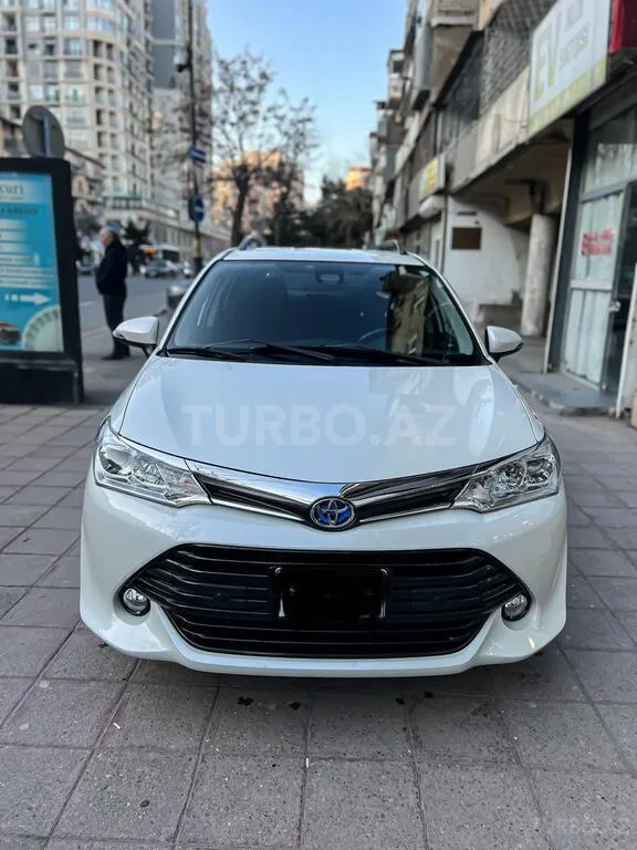 Toyota Corolla Fielder — foto 1/4
