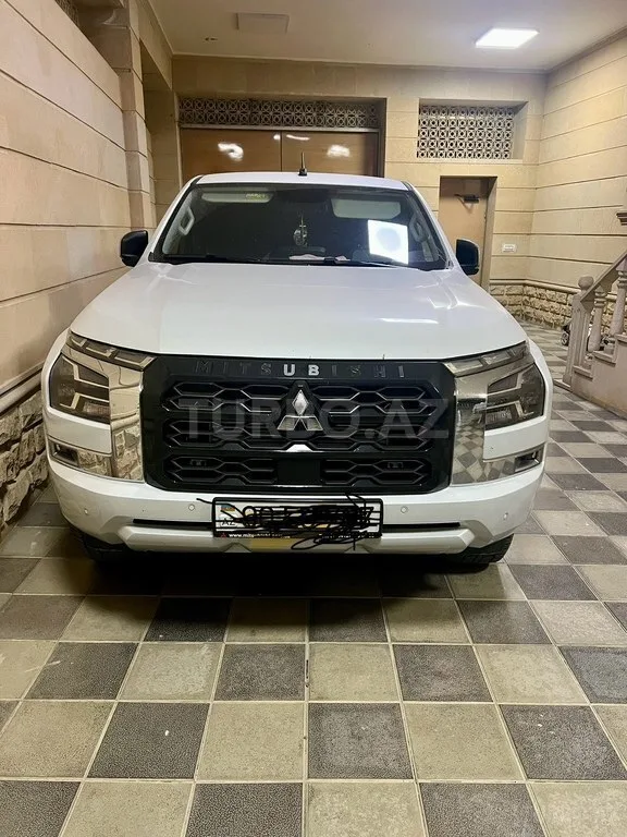 Mitsubishi L200 — foto 1/4