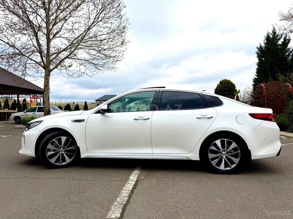 Kia Optima — foto 2/4