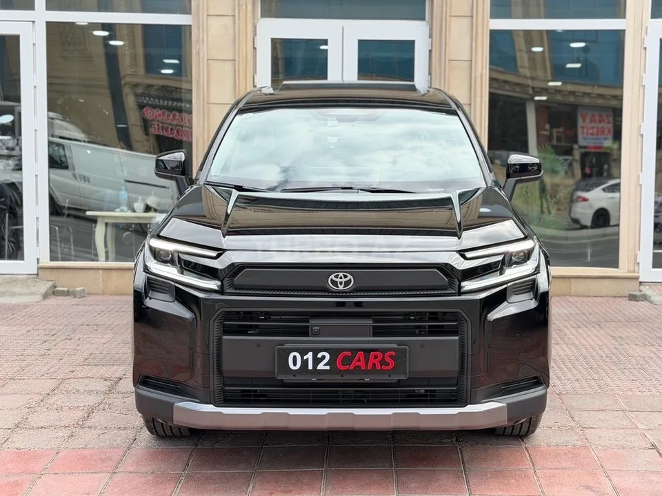 Toyota RAV4 — foto 2/4
