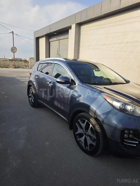 Kia Sportage — foto 4/4