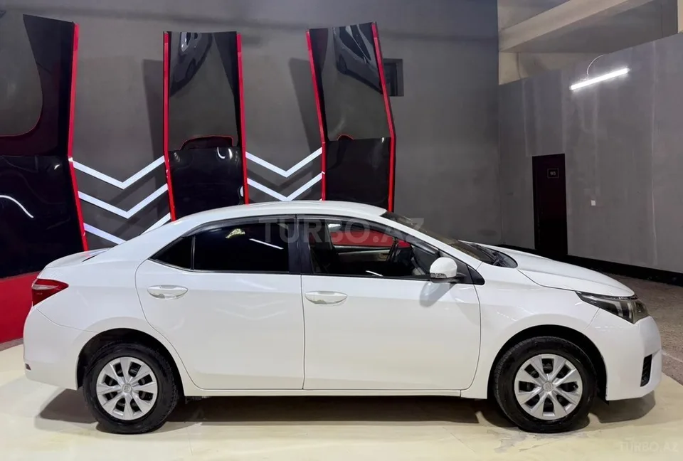 Toyota Corolla — foto 4/4