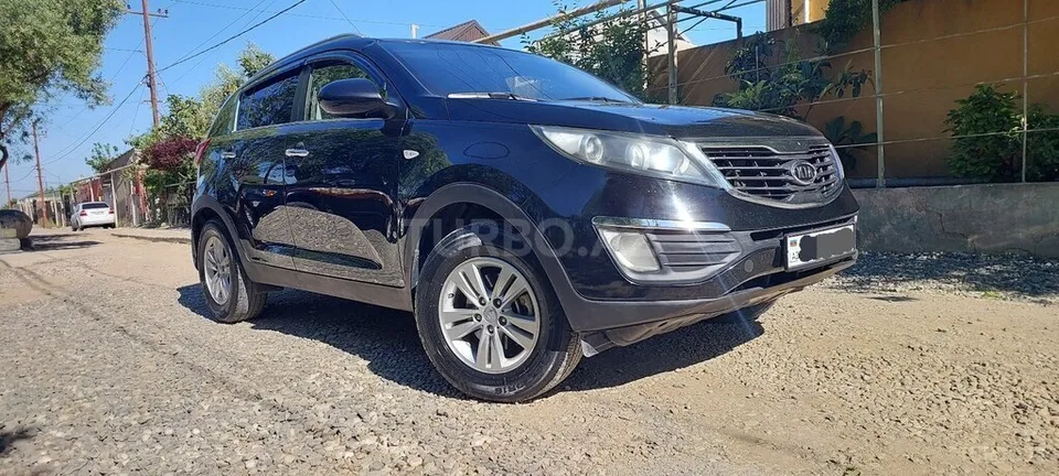 Kia Sportage — фото 4/4