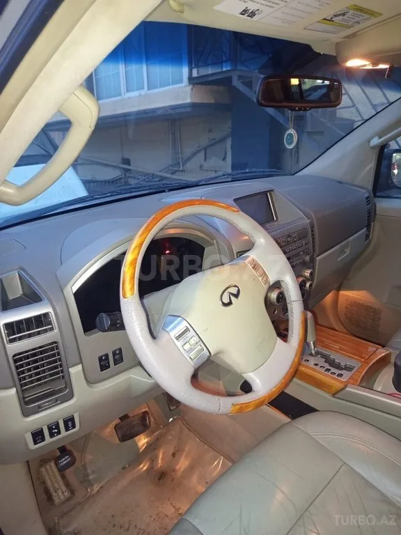 Infiniti QX56 — foto 2/4