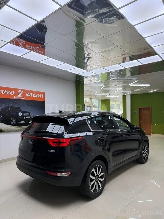 Kia Sportage — foto 4/4