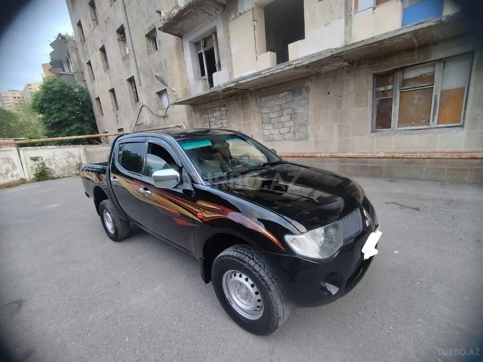Mitsubishi L200 — foto 1/4
