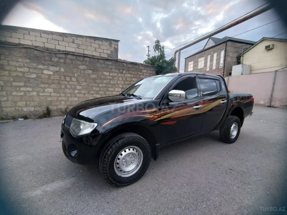 Mitsubishi L200 — foto 3/4