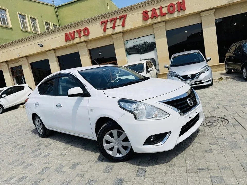 Nissan Latio — foto 2/4