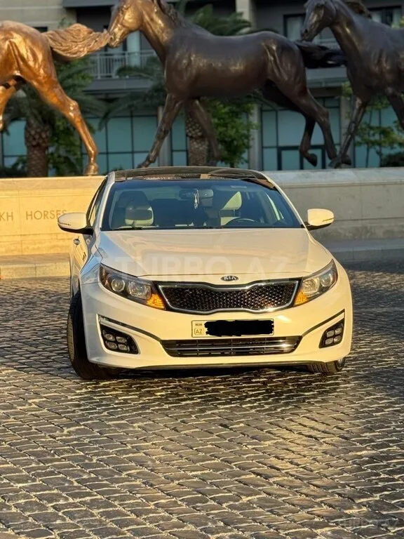 Kia Optima — foto 1/4