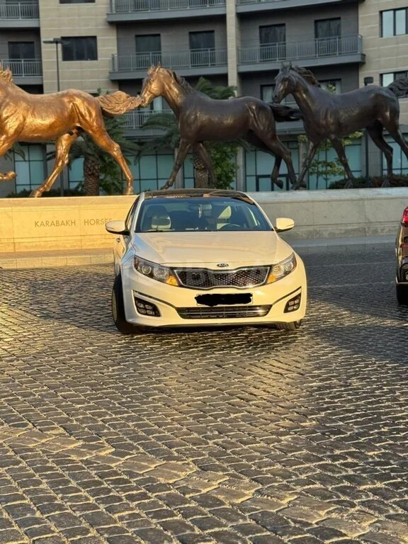 Kia Optima — foto 2/4