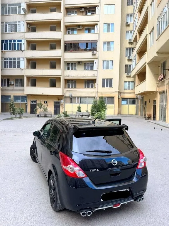 Nissan Tiida — foto 2/4