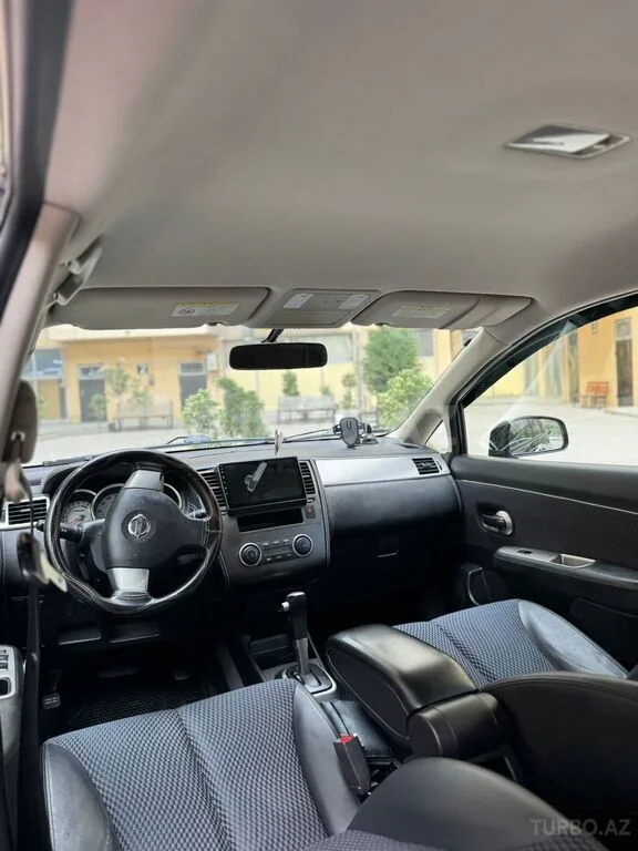 Nissan Tiida — foto 3/4