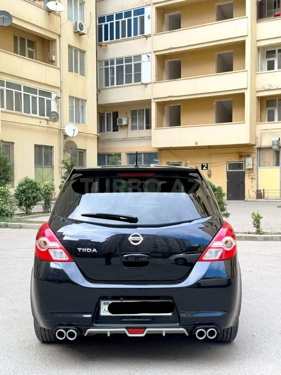 Nissan Tiida — foto 4/4