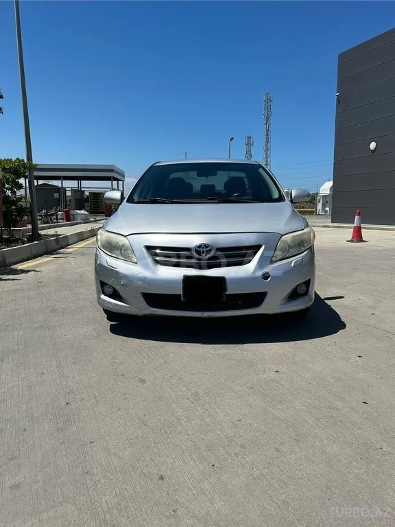 Toyota Corolla — foto 1/4