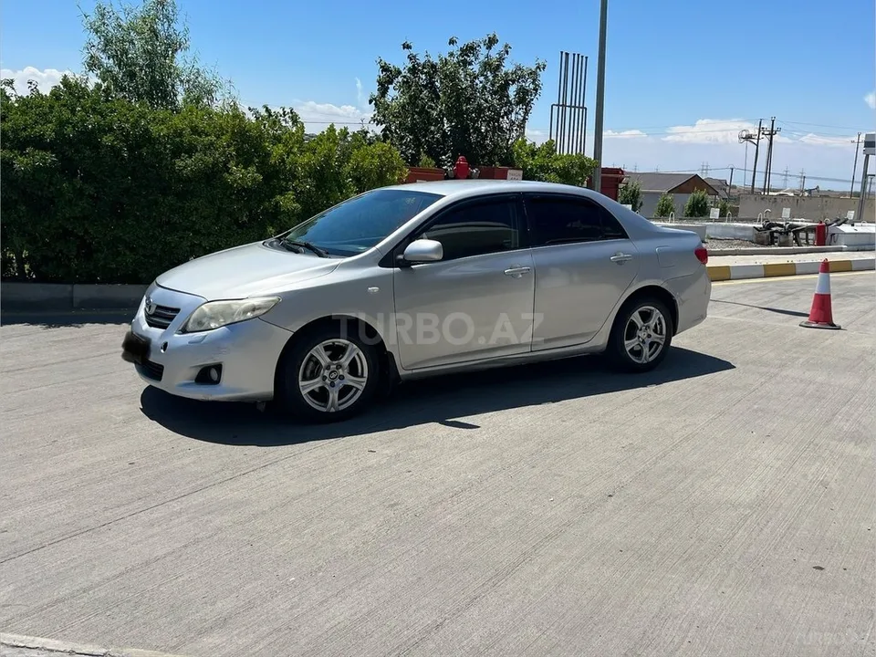 Toyota Corolla — foto 2/4