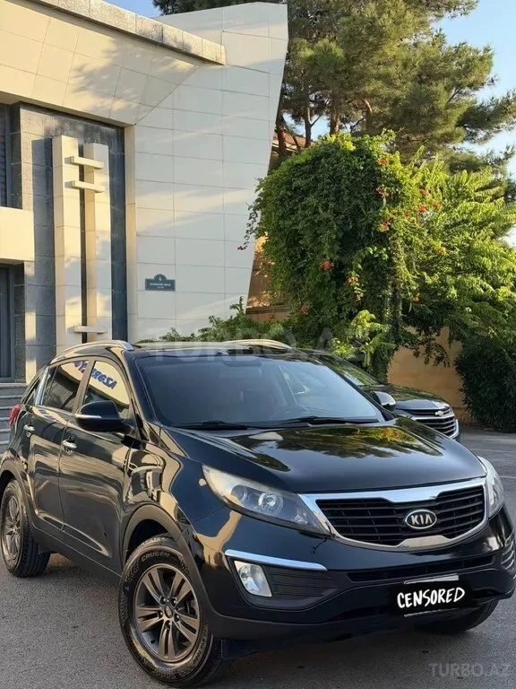 Kia Sportage — фото 1/4