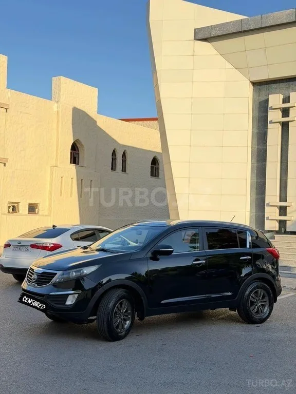 Kia Sportage — фото 3/4