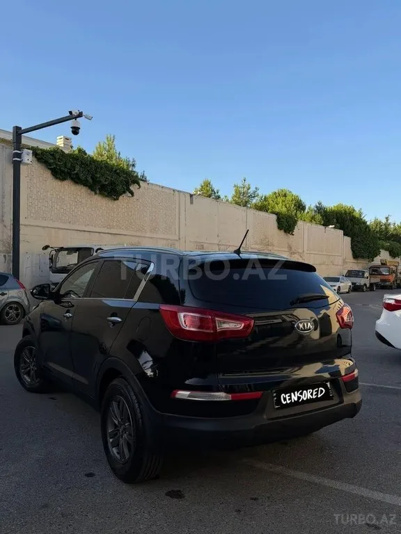 Kia Sportage — фото 4/4