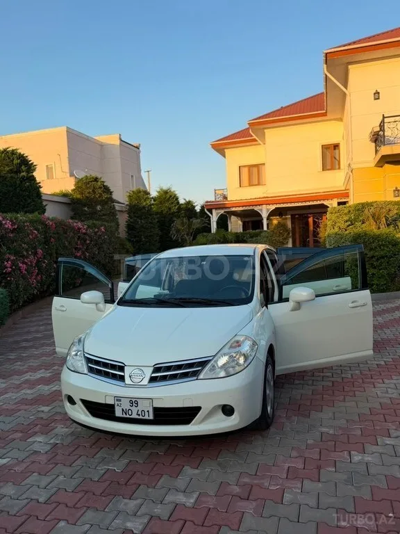Nissan Tiida — foto 2/4