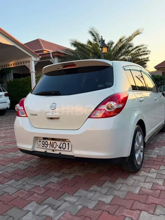 Nissan Tiida — foto 3/4
