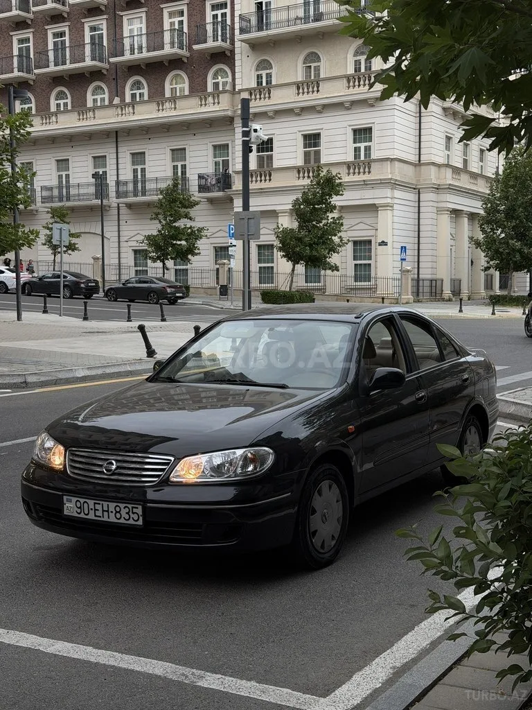 Nissan Sunny — foto 1/4