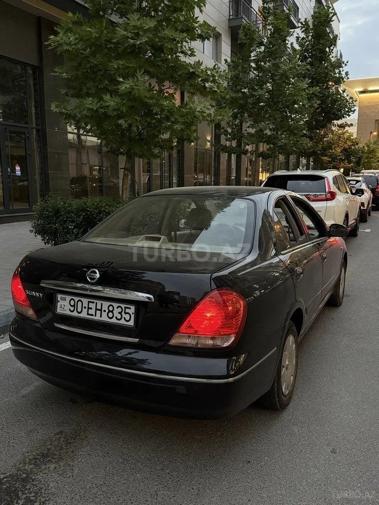 Nissan Sunny — foto 2/4