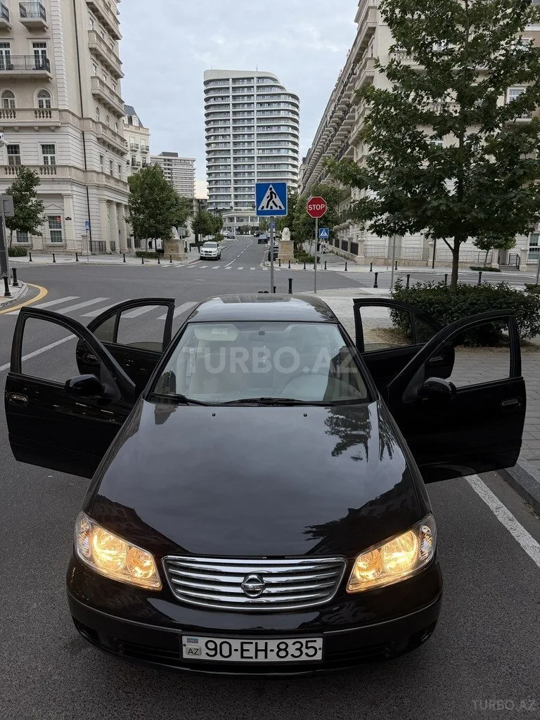 Nissan Sunny — foto 3/4
