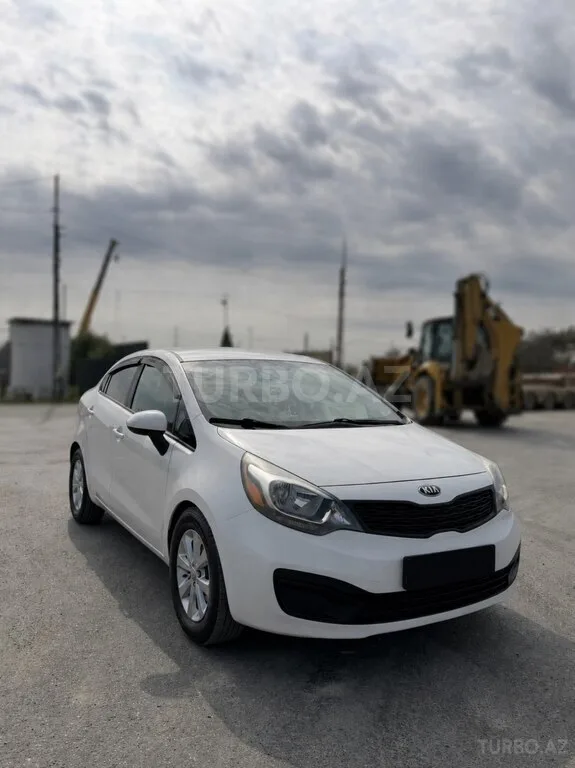 Kia Rio — foto 4/4