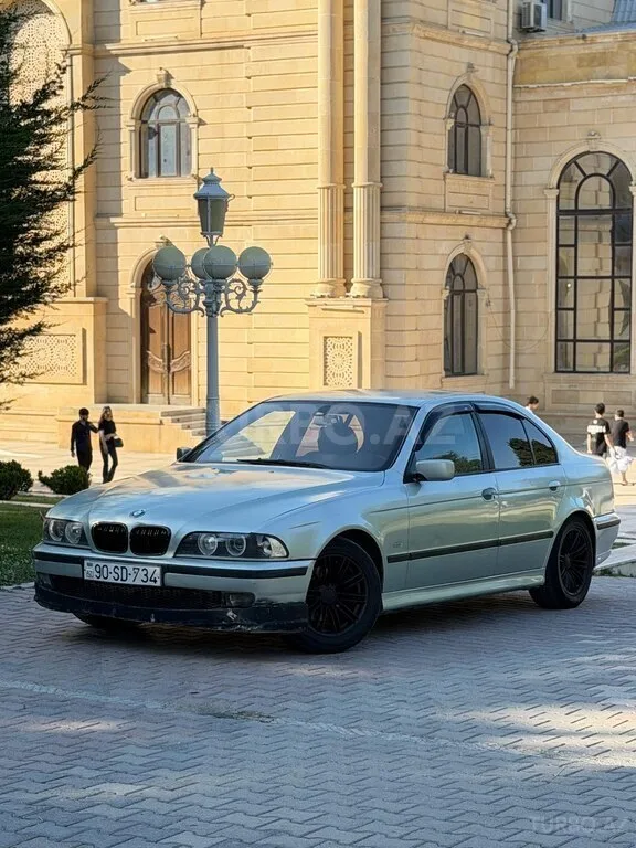 BMW 520 — фото 1/4
