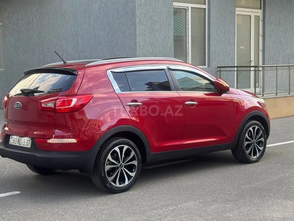 Kia Sportage — foto 4/4