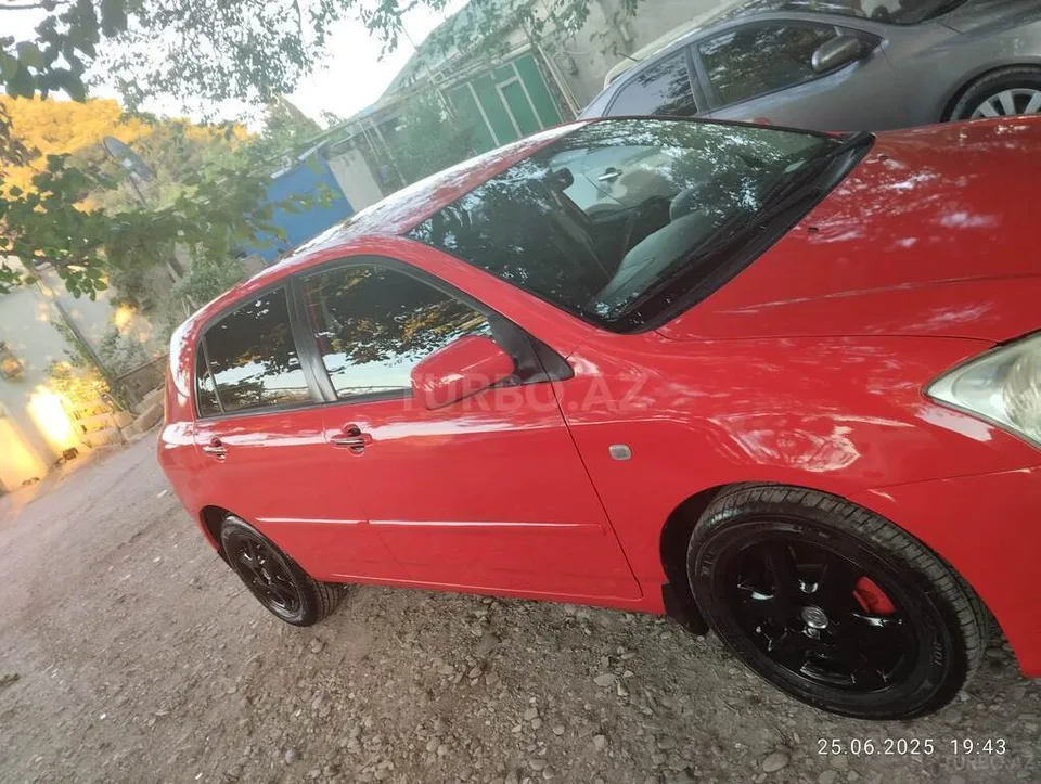Toyota Corolla — foto 2/4