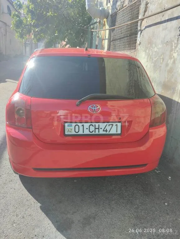 Toyota Corolla — foto 3/4