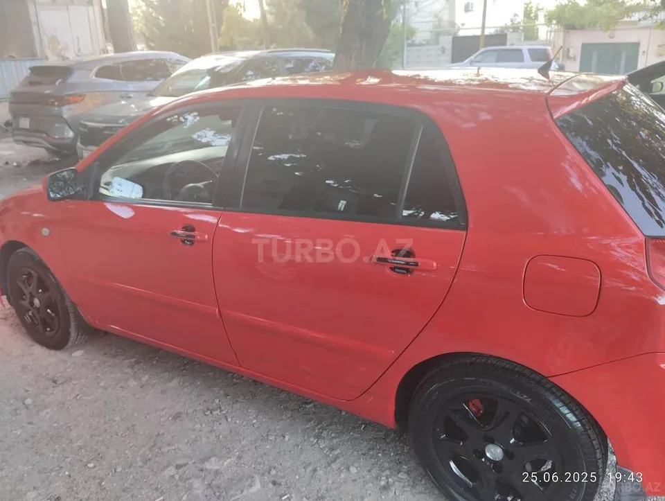 Toyota Corolla — foto 4/4