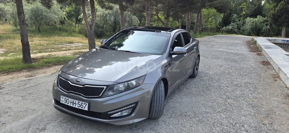 Kia Optima — foto 1/4