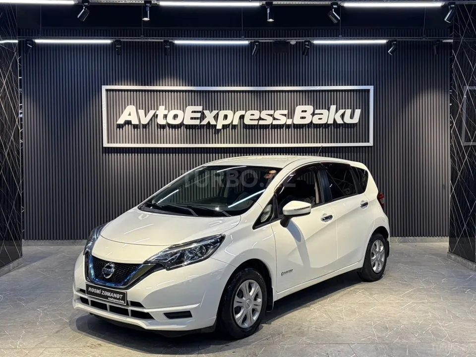 Nissan Note — фото 1/4