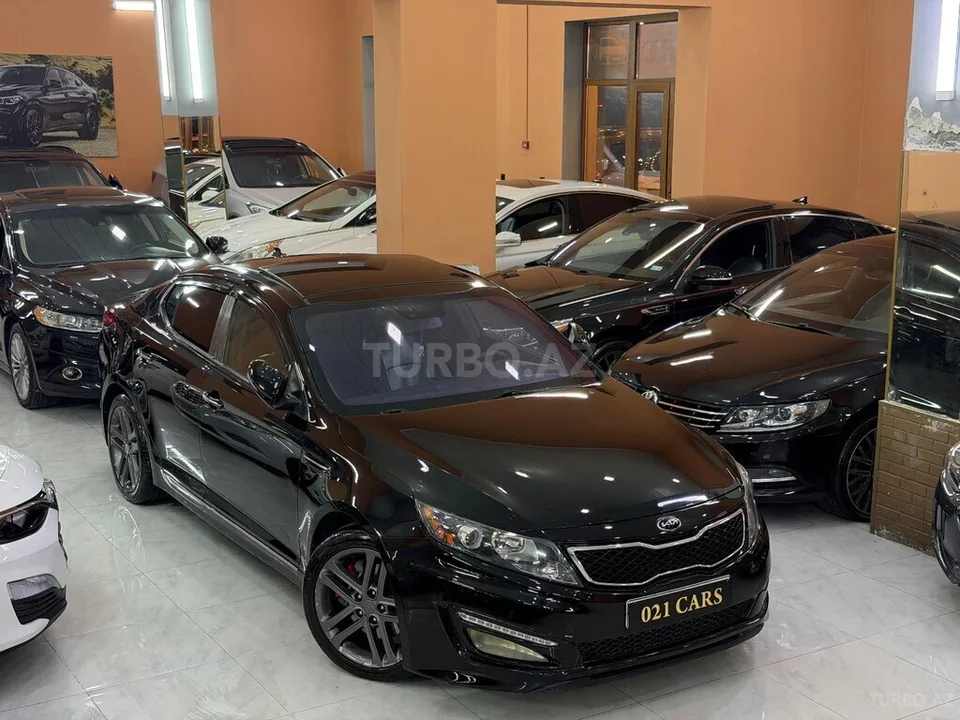 Kia Optima — foto 1/4