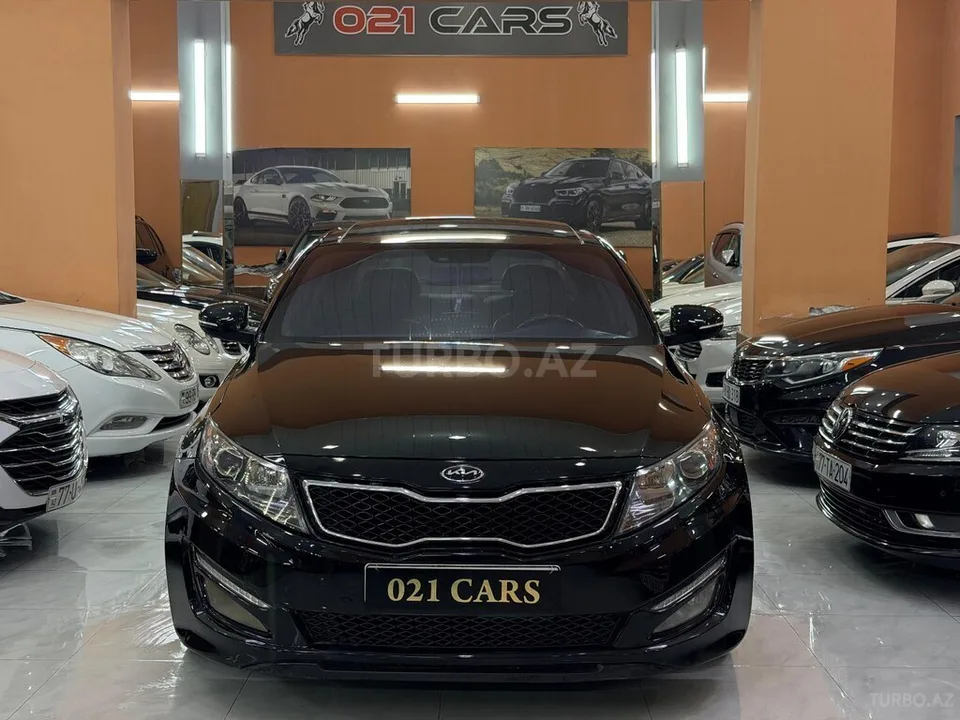 Kia Optima — foto 2/4