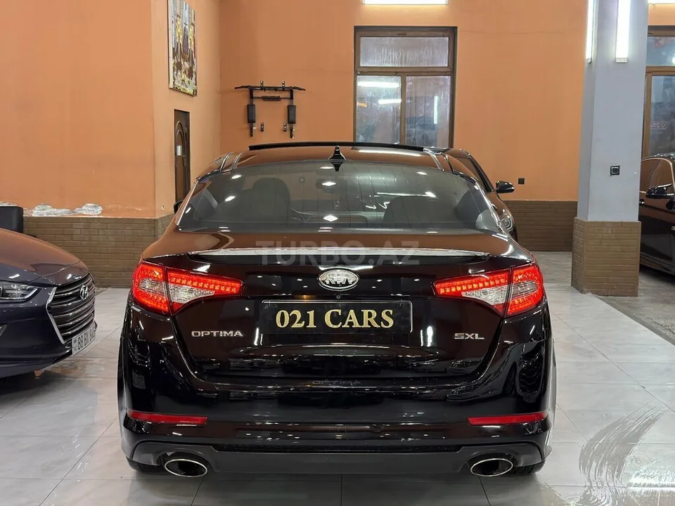 Kia Optima — foto 3/4