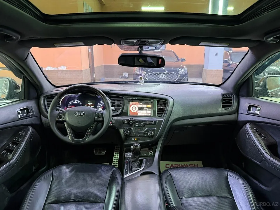 Kia Optima — foto 4/4