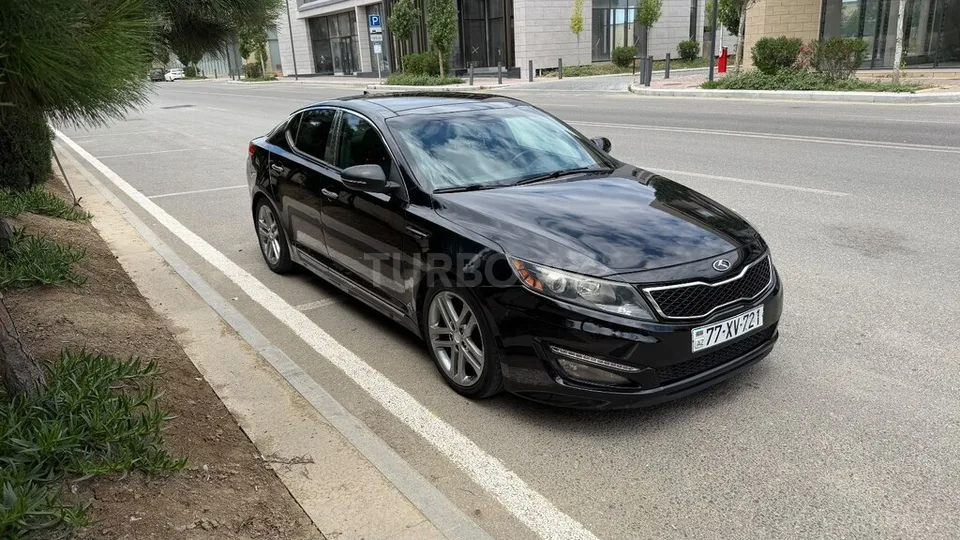 Kia Optima — foto 1/4