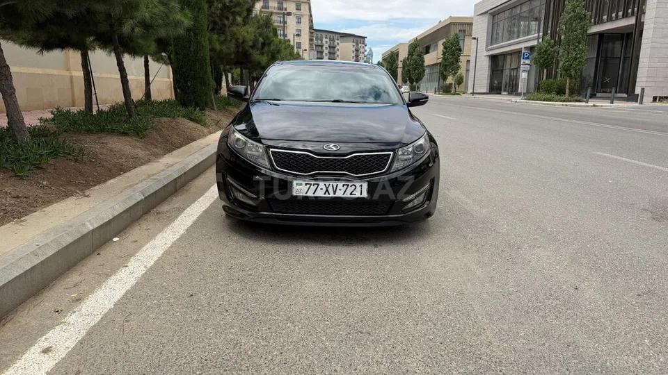 Kia Optima — foto 2/4