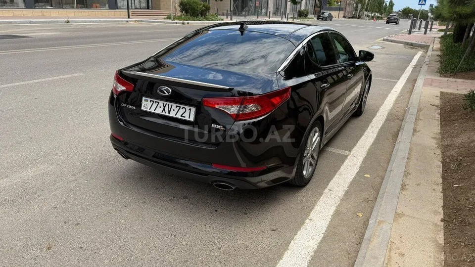 Kia Optima — foto 4/4