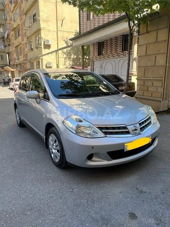 Nissan Tiida — foto 2/4