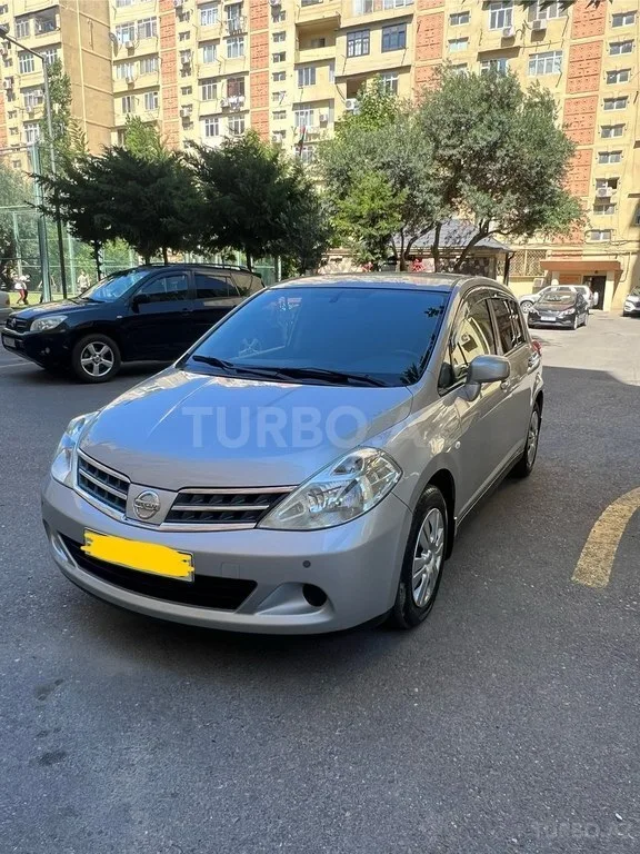 Nissan Tiida — foto 3/4