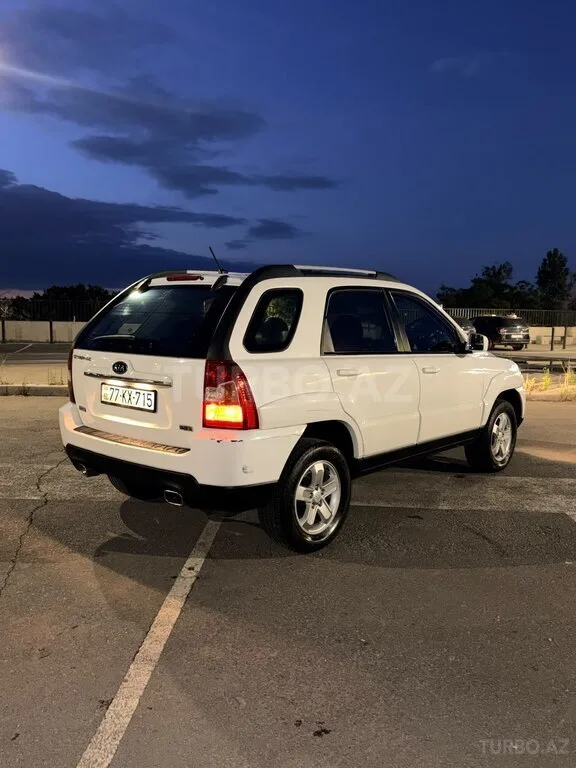 Kia Sportage — фото 3/4